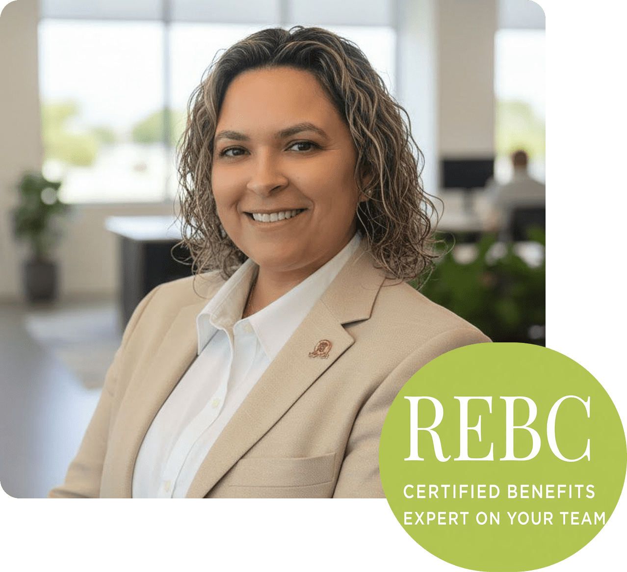 Professional woman in business attire smiling indoors.